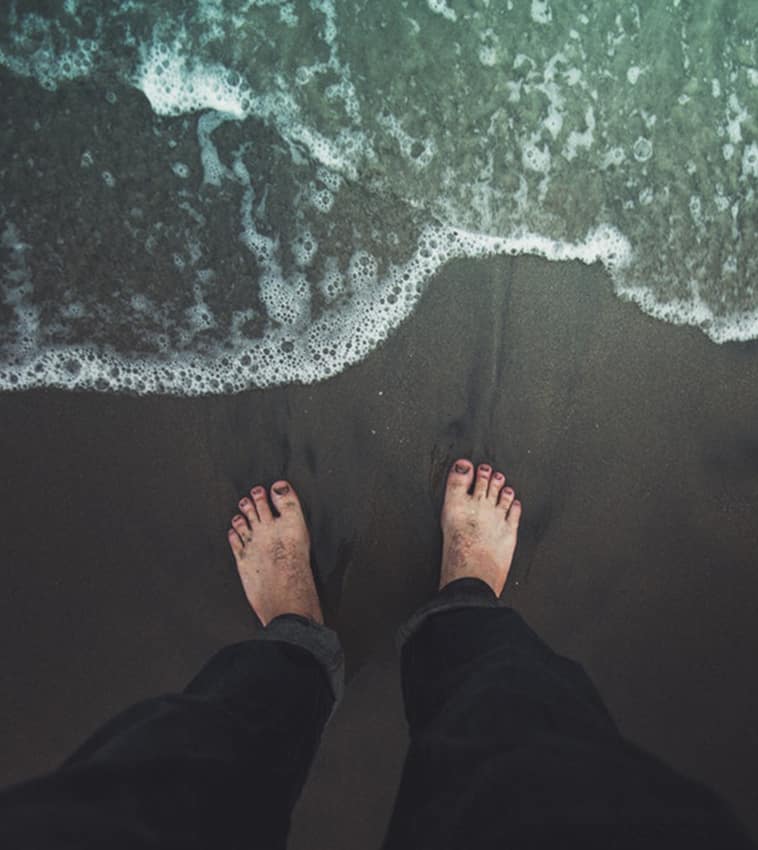 diabetic foot of a girl on beach